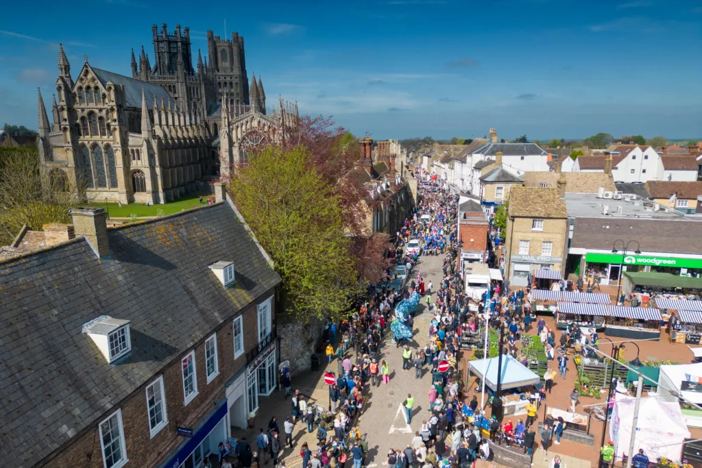 Ely EEL Festival makes its way through the city - News for Peterborough Dubbed ‘Coronation Eel Day’ the spectacular eel focal point snaked its way from Cross Green through the streets to Jubilee Gardens to begin a packed day of events by the river. Picture: TERRY HARRIS