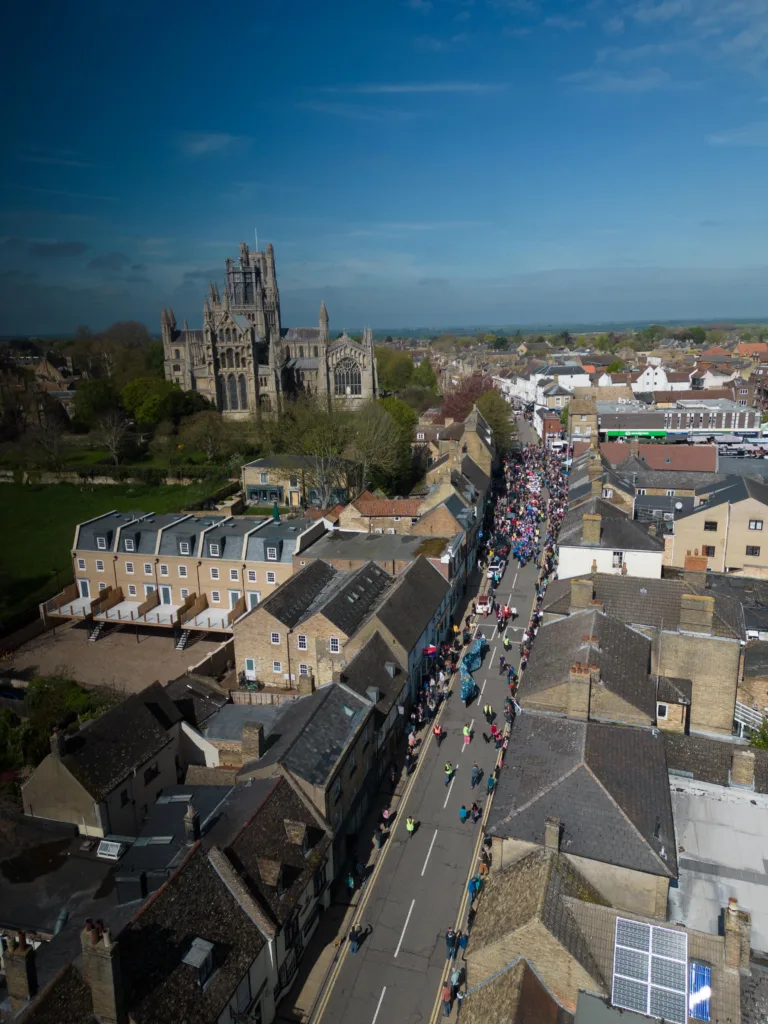 Ely EEL Festival makes its way through the city - News for Peterborough Dubbed ‘Coronation Eel Day’ the spectacular eel focal point snaked its way from Cross Green through the streets to Jubilee Gardens to begin a packed day of events by the river. Picture: TERRY HARRIS