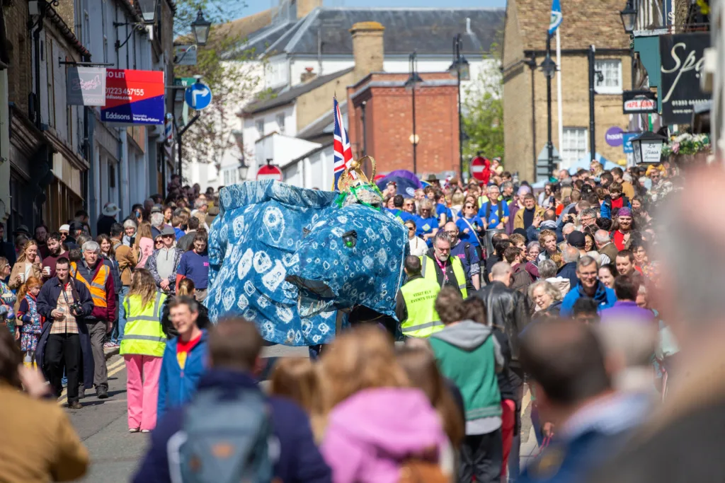 Ely EEL Festival makes its way through the city - News for Peterborough Dubbed ‘Coronation Eel Day’ the spectacular eel focal point snaked its way from Cross Green through the streets to Jubilee Gardens to begin a packed day of events by the river. Picture: TERRY HARRIS