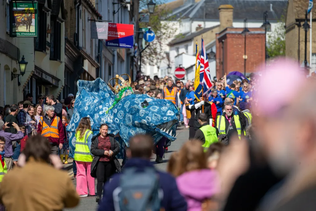 Ely EEL Festival makes its way through the city - News for Peterborough Dubbed ‘Coronation Eel Day’ the spectacular eel focal point snaked its way from Cross Green through the streets to Jubilee Gardens to begin a packed day of events by the river. Picture: TERRY HARRIS