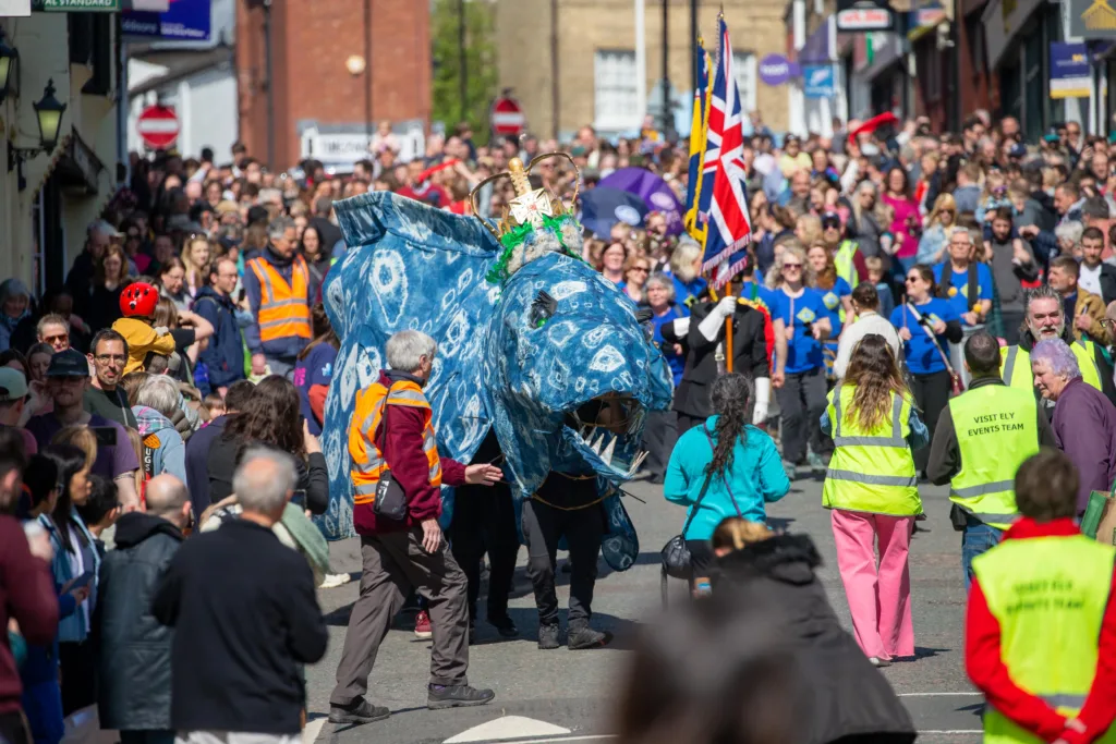 Ely EEL Festival makes its way through the city - News for Peterborough Dubbed ‘Coronation Eel Day’ the spectacular eel focal point snaked its way from Cross Green through the streets to Jubilee Gardens to begin a packed day of events by the river. Picture: TERRY HARRIS