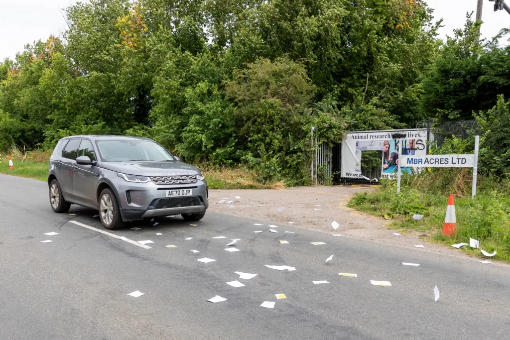 Babestation Zoe Grey and Stella Paris turn up to raise awareness of animal testing at MBR Acres, Bailiffs on behalf of Mills and Reeves throw papers at people in an attempt to serve them but just litter the highway. MBR Acres, Huntingdon Monday 10 July 2023. PHOTO: Terry Harris