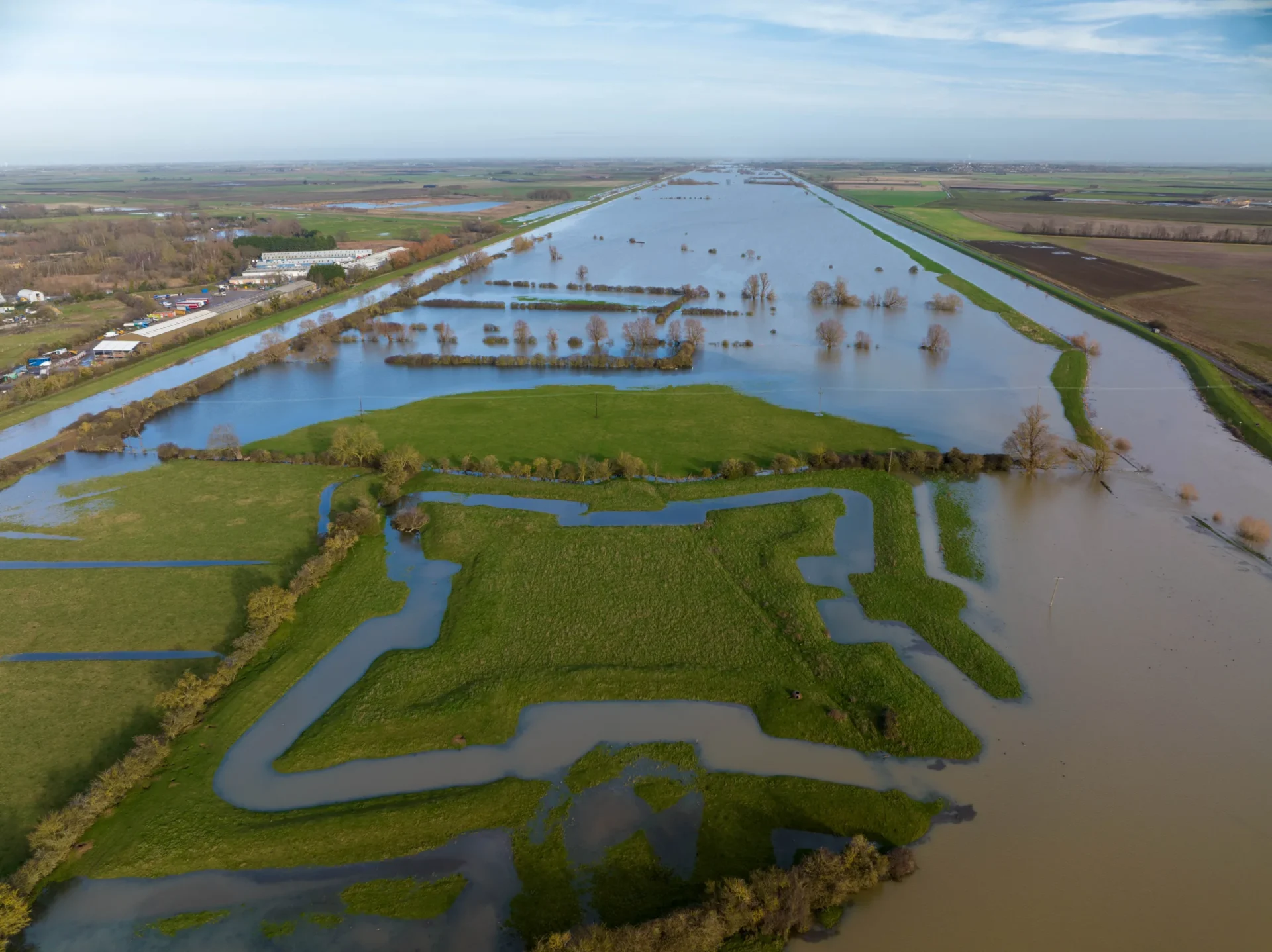 News for Peterborough - Flooding reveals English Civil War fort after Storm Henk . The clear outline of a 400-year-old English Civil War fort has been highlighted after heavy rain and flooding filled a moat around the earthworks following Storm Henk. Aerial photos show The Earith Bulwark in the Cambridgeshire Fens, which was built around 1643 by Oliver Cromwell's forces to protect crossing points on the local rivers, including the River Great Ouse. Picture by Terry Harris.