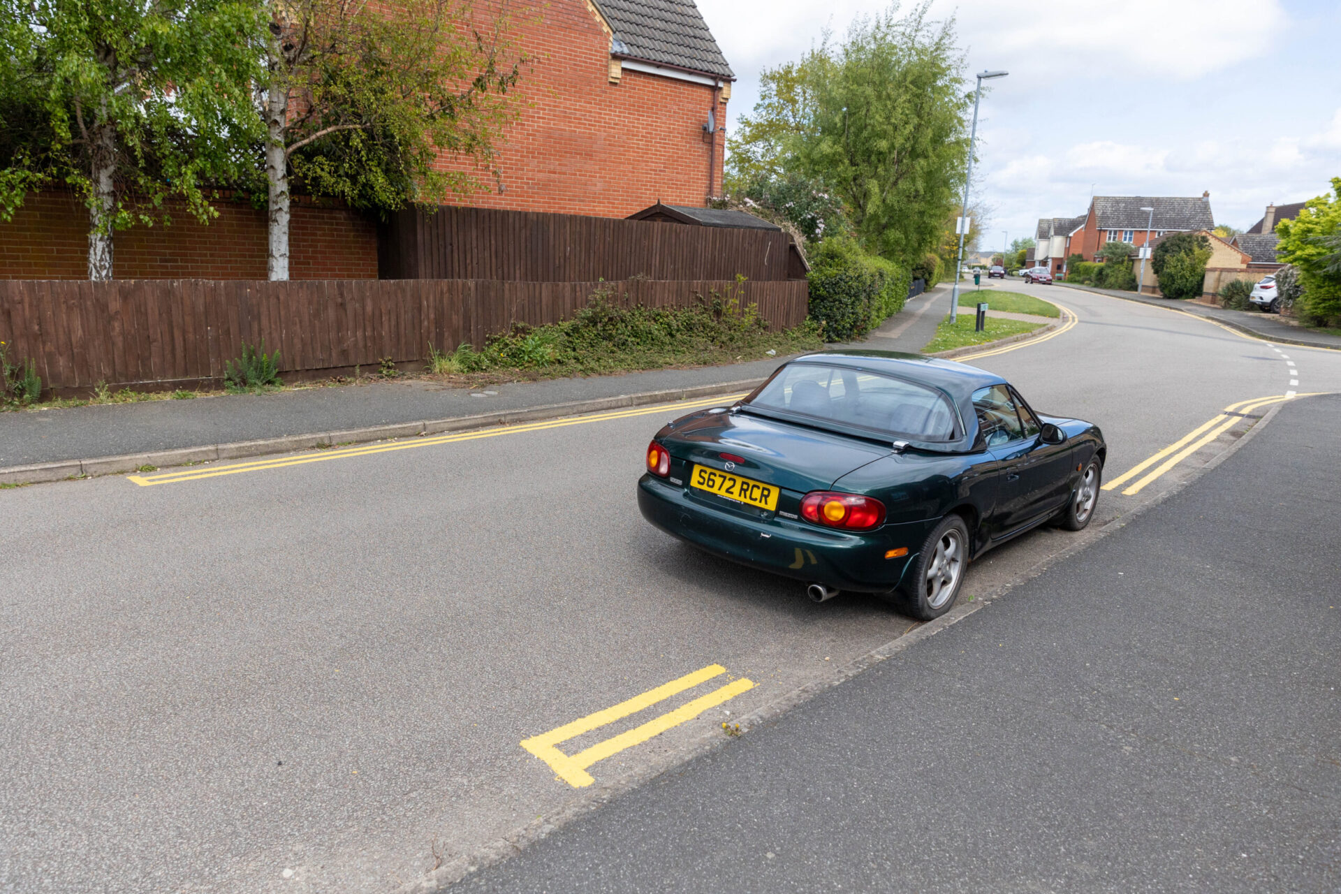 News for Peterborough - County council contractors plan a return visit to Witchford near Ely to complete installation of yellow lines. They missed some spots because cars were parked there when they came to carry out the lining. PHOTO: Terry Harris