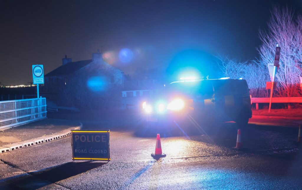 Police block the North Bank, Whittlesey, tonight as they conduct a search for a missing man. PHOTO: Terry Harris